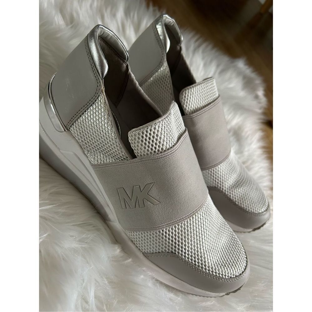 Michael kors silver sneaker size 9.5 slip on